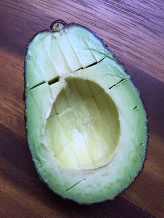 Cutting avocado for guacamole